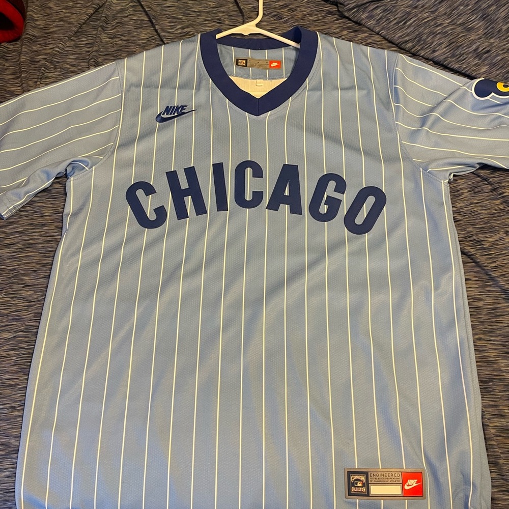Nike Light Blue Jersey with White Stripes